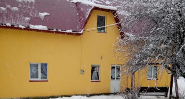 Podobovets House | Біля комори
