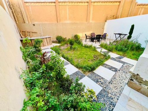 Sheikh Zayed City Apartment | شقة فندقية بالشيخ زايد مدخل خاص بحديقة داخل كمبوند زايد هايتس