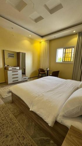 Shihar Apartment | شقة للعائلات بغرفتين نوم واطلالة على الحديقة - وصول ذاتي