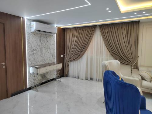 Al Duqqi Apartment | شقق فندقية متميزة بالدقي