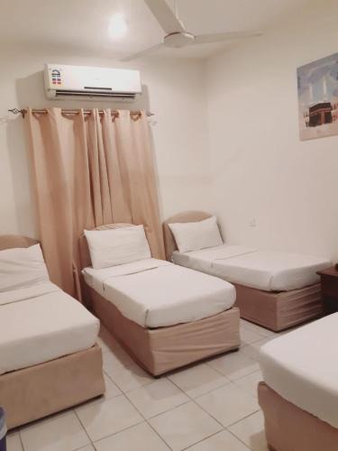 Mecca House | مكة المكرمة غرف عائلية فندق بجوار الحرم تخفيضات للمجموعات ناحية برج الساعة Makkah room in HOTEL near ALHARAM Multiple ROOM