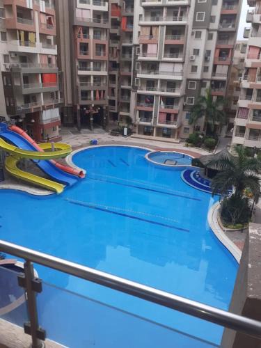 Shurtah al-Dakhlah Apartment | منتجع هوليداى شاطئ النخيل