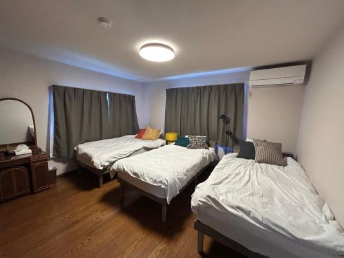 Takuma Apartment | 島めぐりに便利な一棟貸切宿あぽわん