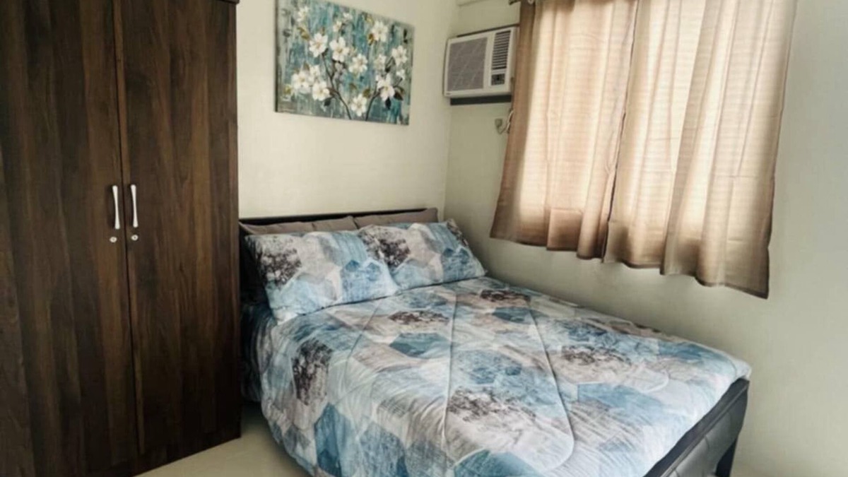 Basak Condo | 1 bedroom condo living room and kitchen sleeps 4 EARLY CHECK IN -LATE CHECK OUT