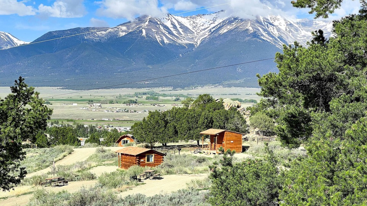Buena Vista Cabin | 1 Room Dry Camping Cabin. Sleeps up to 4 in one queen bed and a set of twin bunks.