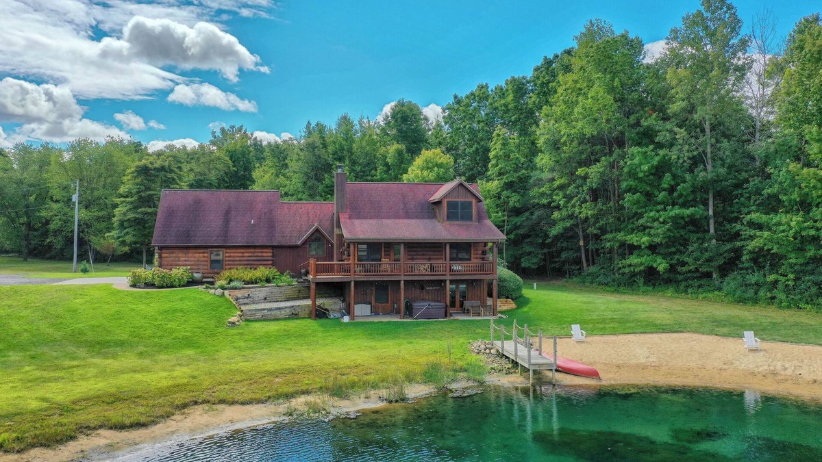 Fennville Cabin | 11 Acre Wood - Cabin getaway - fishing/swimming pond - hot tub