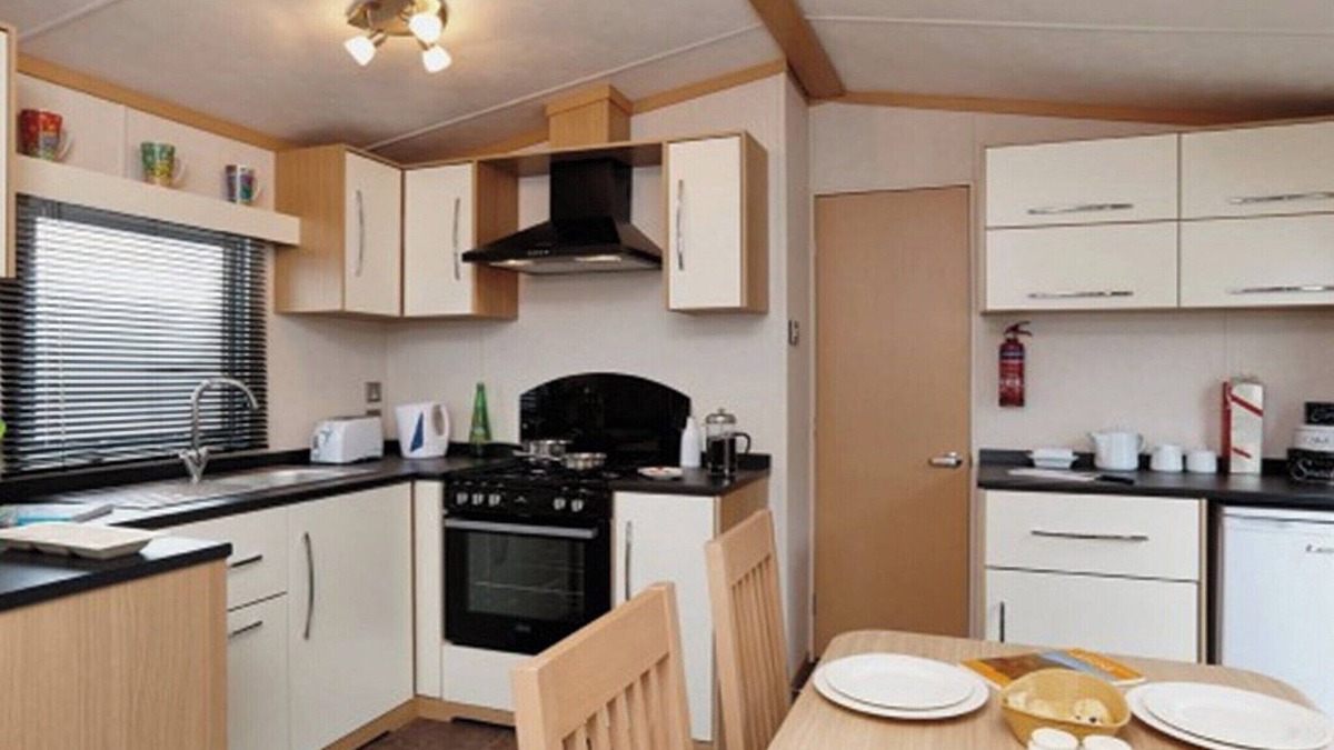 Wigton House | 12ft-wide caravan with one double and two twin.