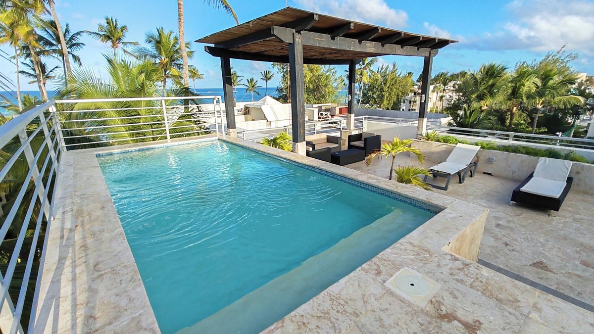 El Cortecito Condo | 14BR Spacious Multi-Unit Retreat with Rooftop Plunge Pool - Walk to Beach +Bonus