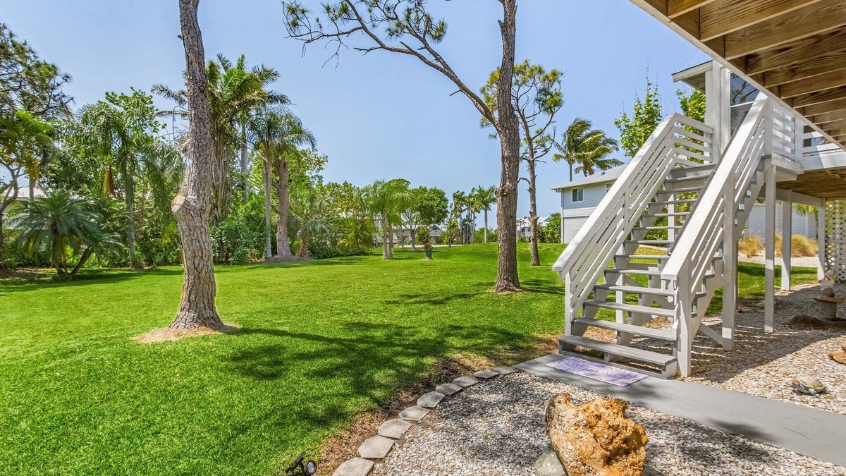 Pine Island Center House | 2/2 Heart of Pine Island Home, with Wrap Around Porch!