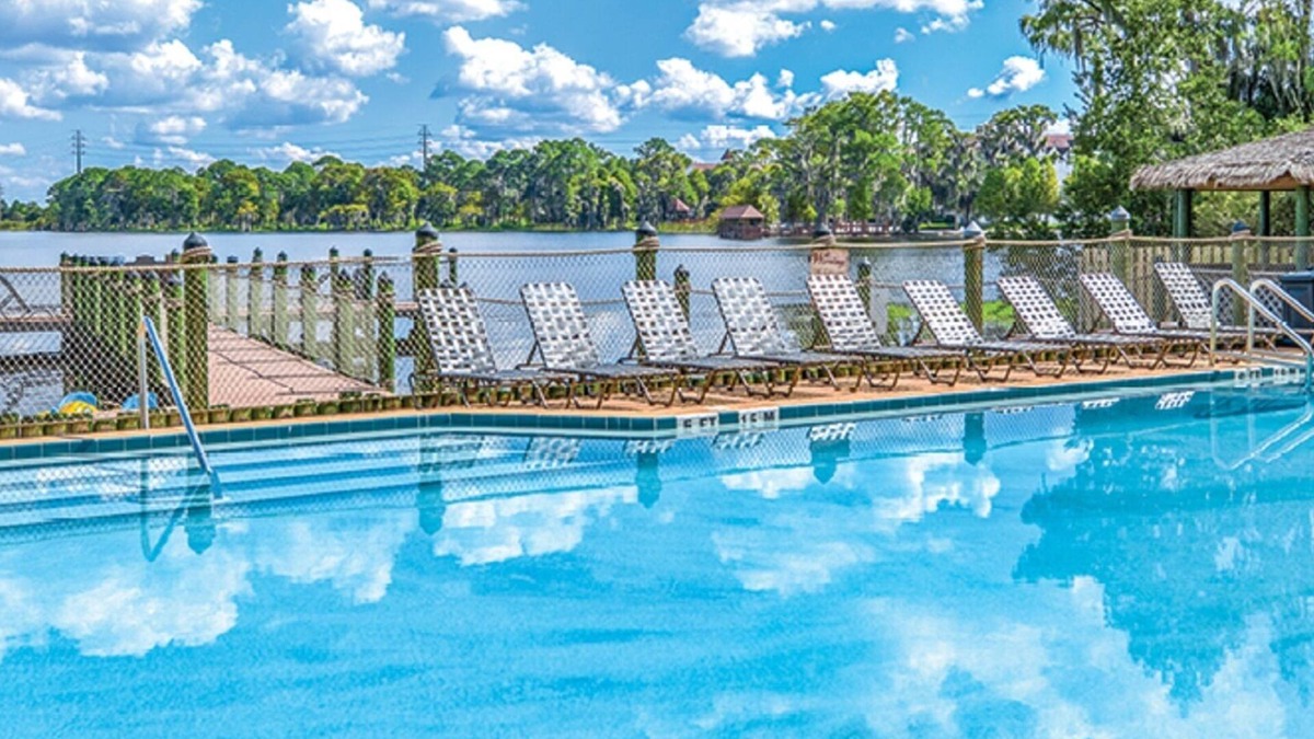 Florida Central Atlantic Coast Condo | 2 BDRM~ ON LAKE BRYAN~ DISNEY 7 MILES, 5 MILES TO SEAWORLD, POOLS/FISHING & MORE