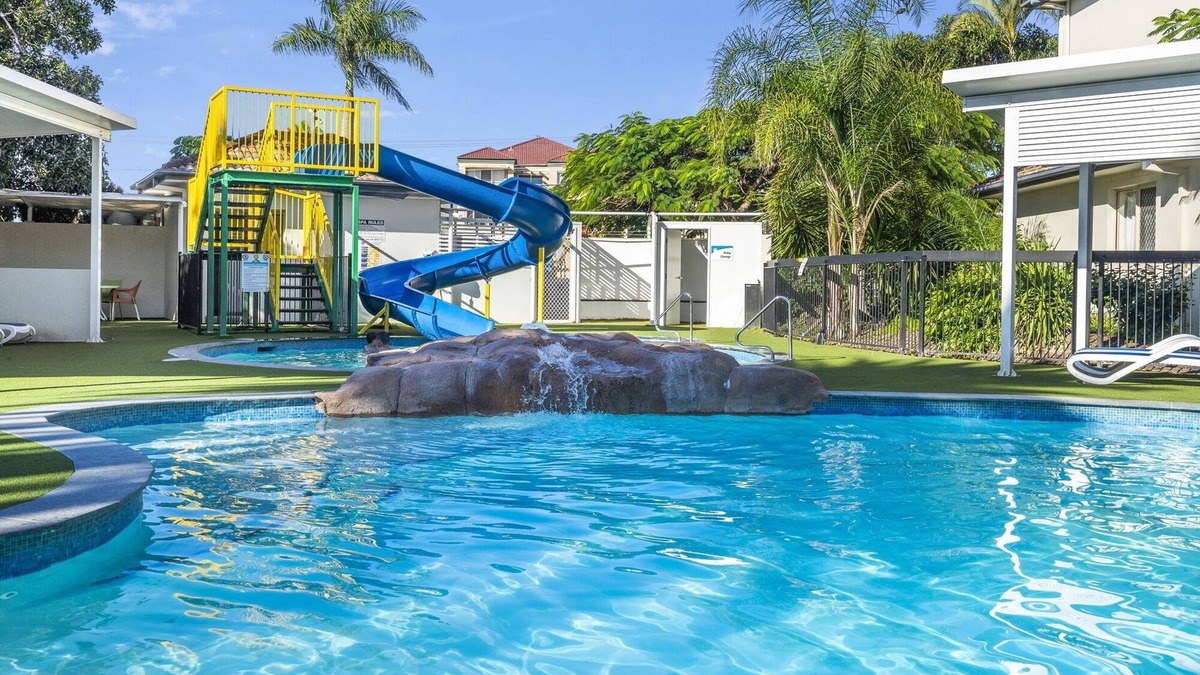 Mermaid Beach Apartment | 2-Bed Family Haven with Pools, BBQ & Playgrounds