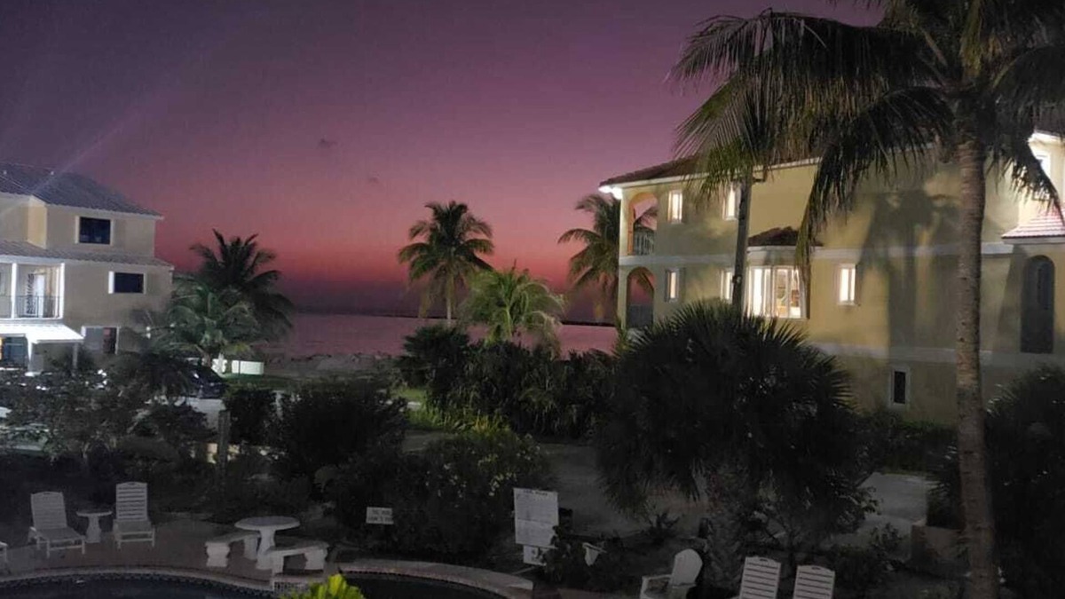 Bahamas Terrace Condo | 2-bedroom condo in oceanfront complex in Freeport with pool, WiFi, beach chairs.