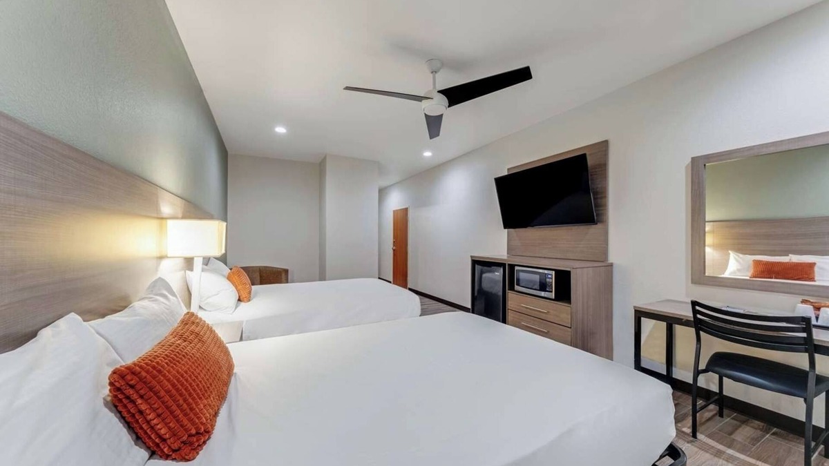 Eastside Promise Neighborhood Hotel | 2 Spacious Room w/Complimentary Breakfast Ideal for Group Business Trip
