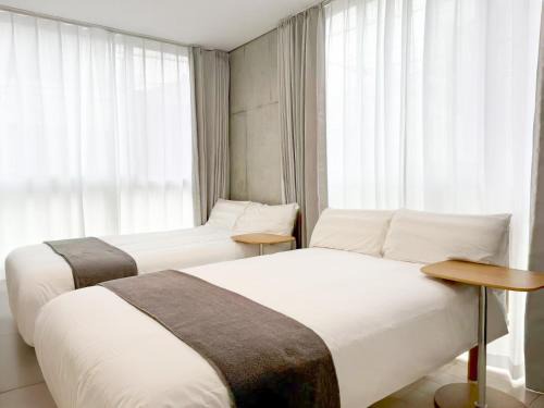 Higashinippori Apartment | 202Room,7-minute walk from Uguisudani Station located on the 2nd floor of an apartment-style building Twin room No elevator