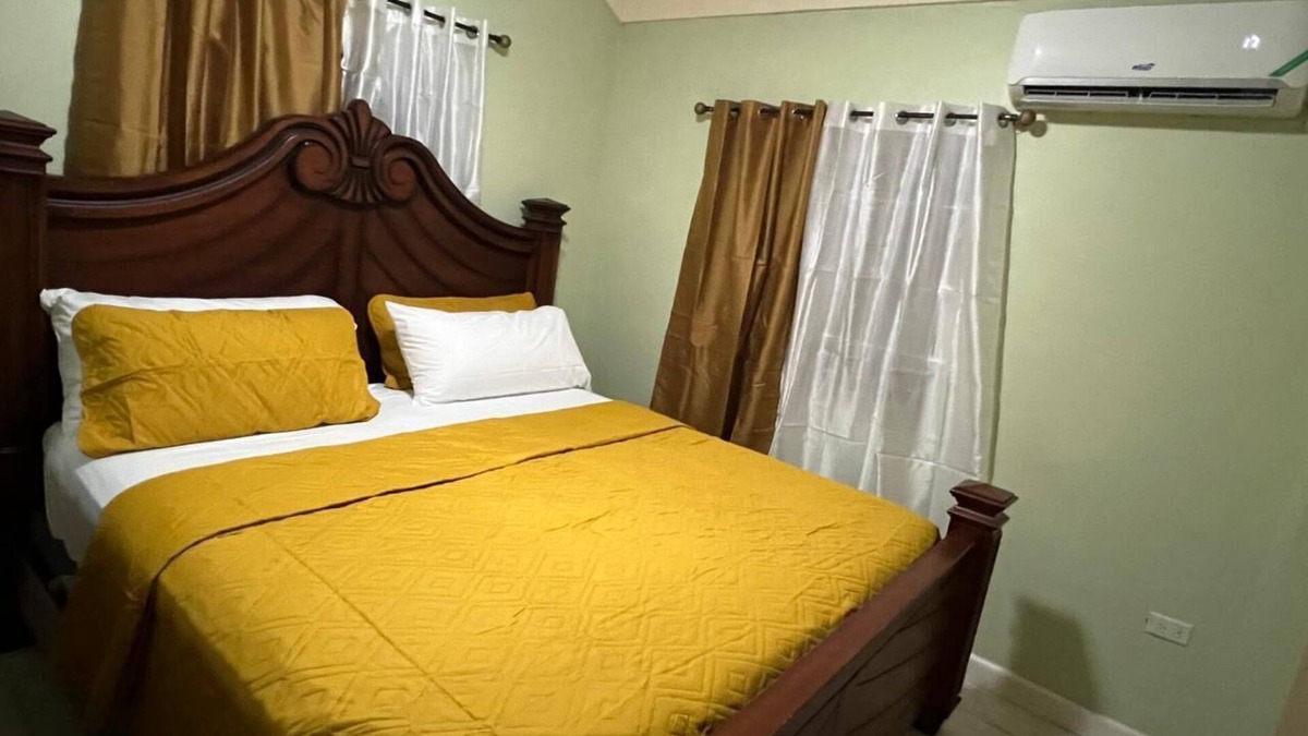 Spring Village House | 25 minutes from Kingston! Cozy Retreat in The Orchards, St. Catherine