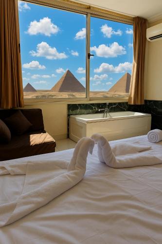 Kafrat al Jabal Apartment | 2BR Three Pyramids & Sphinx View Apartment