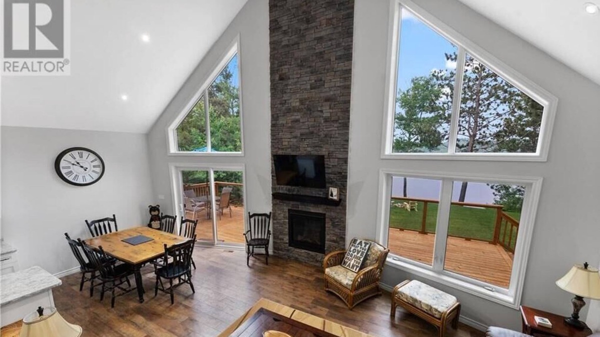Madawaska Valley Cottage | 3 bedroom open concept Lake front house with shallow entry, sandy bottom beach