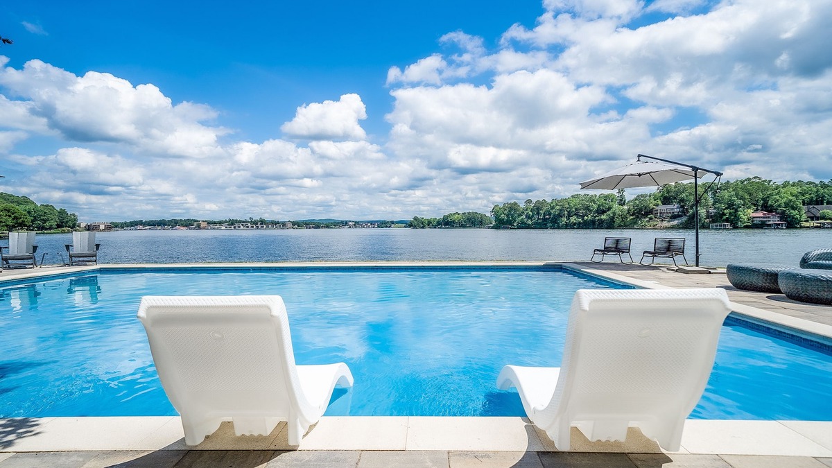 Mid America House | 3-home lakefront retreat with outdoor pool, fireplaces, grills, patios, & views