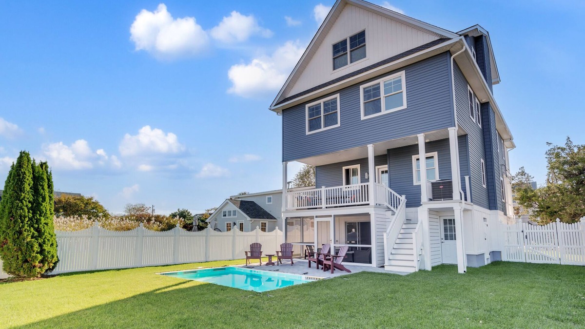Admiral Estates House | 3 levels with 5 bedrooms, 4.5 baths, elevator, heated pool, and lots of gathering spaces both inside and out!