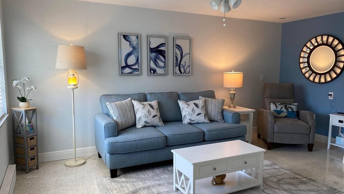Holmes Beach Apartment | 3 Minute walk to beautiful AMI beach! Old Florida Charm with a Modern Flair!