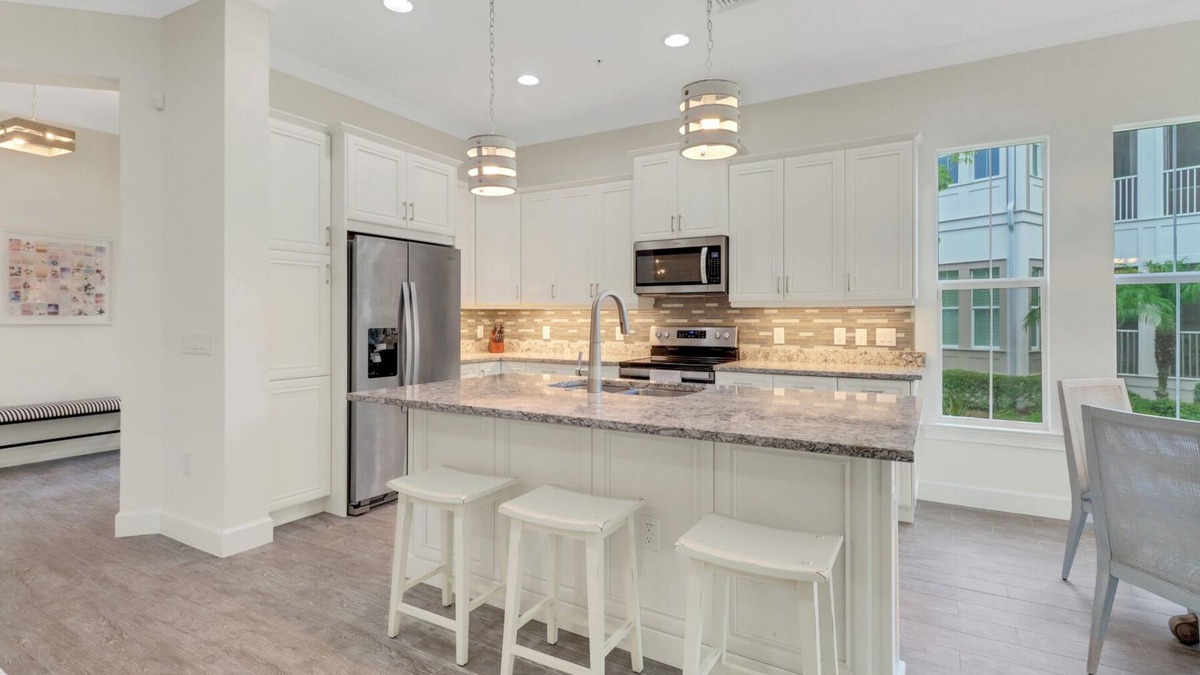 Isles of Collier Preserve Apartment | 30-day minimum lease | Isles of Collier | 3 bedrooms | 3 bathrooms | a den/office | sunroom | 2-car garage.