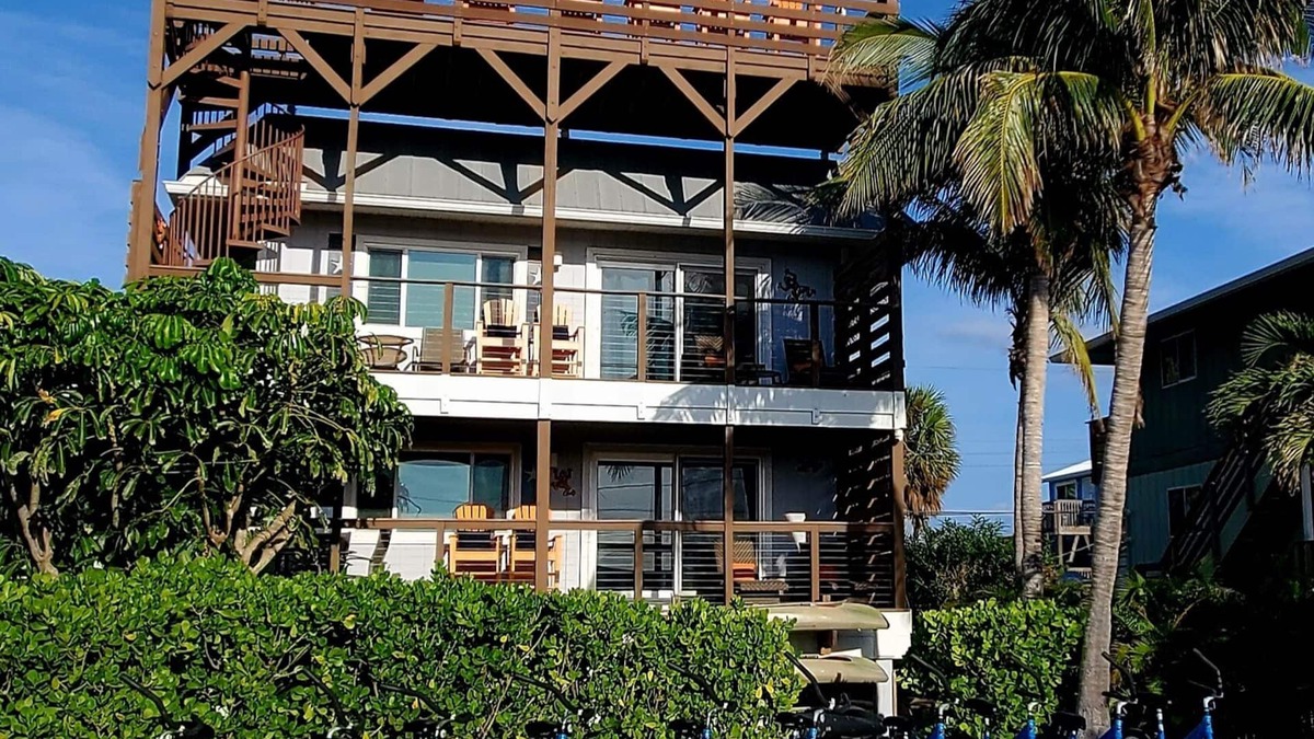 Englewood House | 30 Seconds To Beach Path! Tiki Bar with outdoor TV! Bikes, Kayaks, Sups & more!