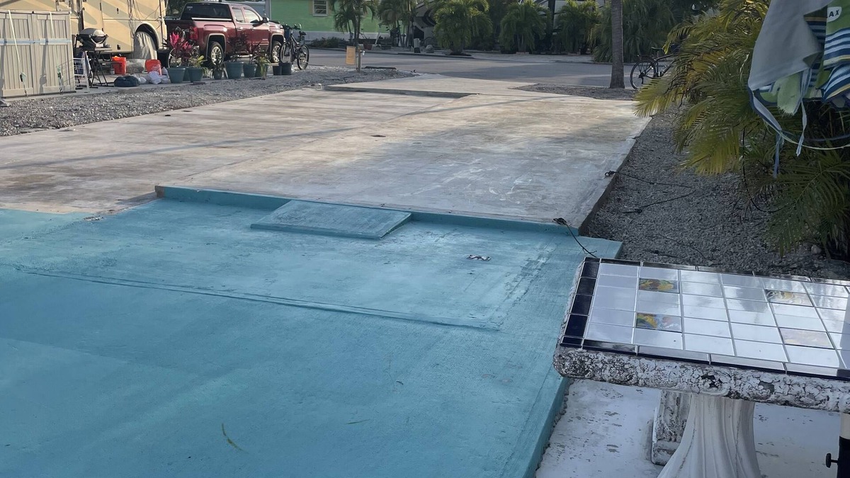 Cudjoe Key Resort | 35'x70'WF RV Site on canal for rent for RV owners. Pet friendly gated community.