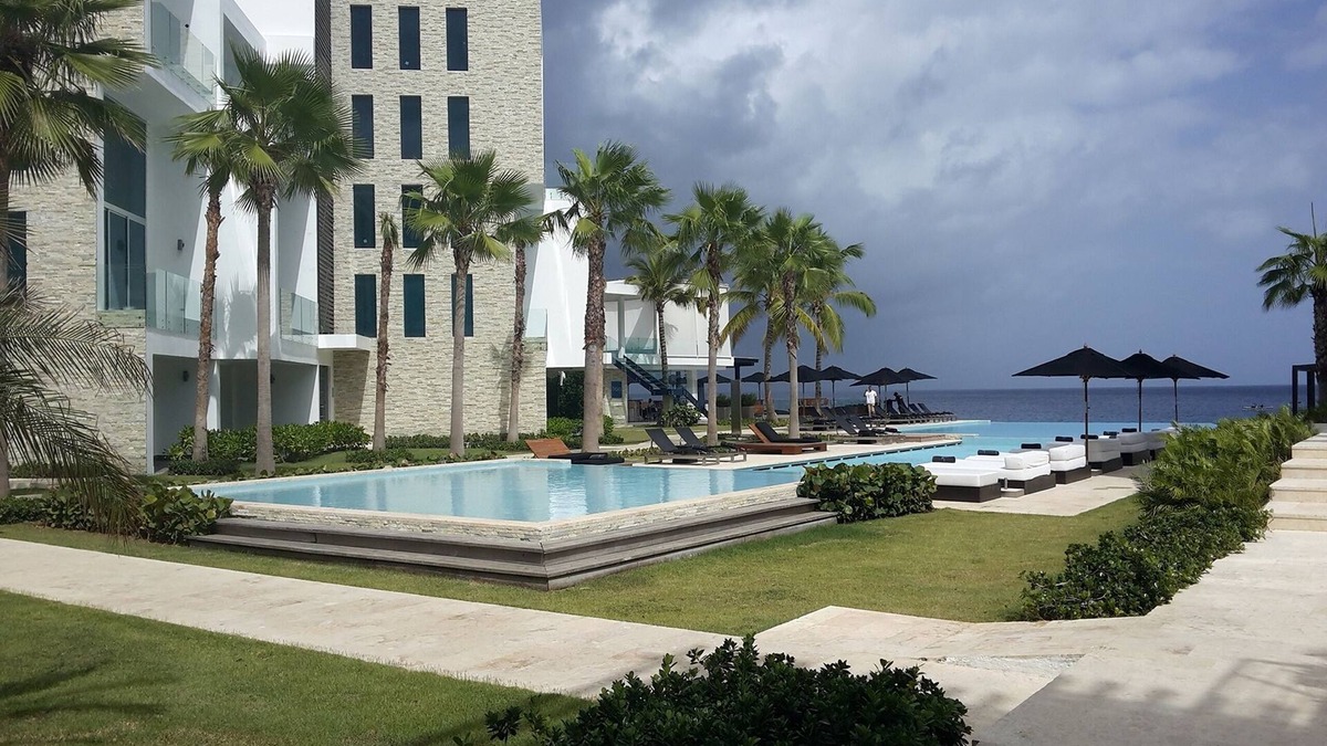 El Batey Apartment | 3BD luxury beachfront condo with gym, elevator, infinity pool. Reduced rate!