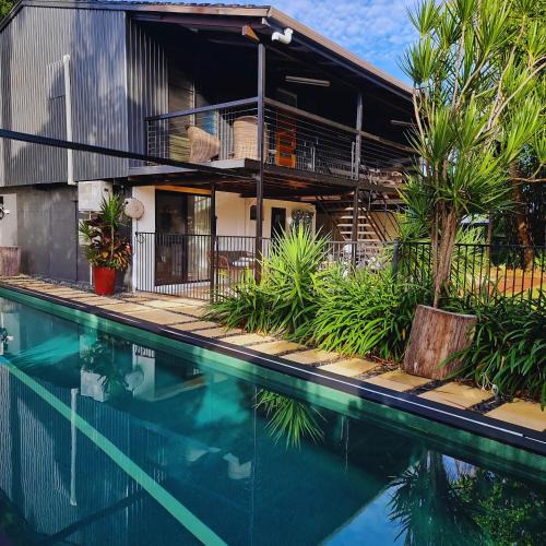 Wagaman House | 4 BDR Airconditioned Tropical Escape, Lap Pool & Parking for Caravans, Boats and Trailers