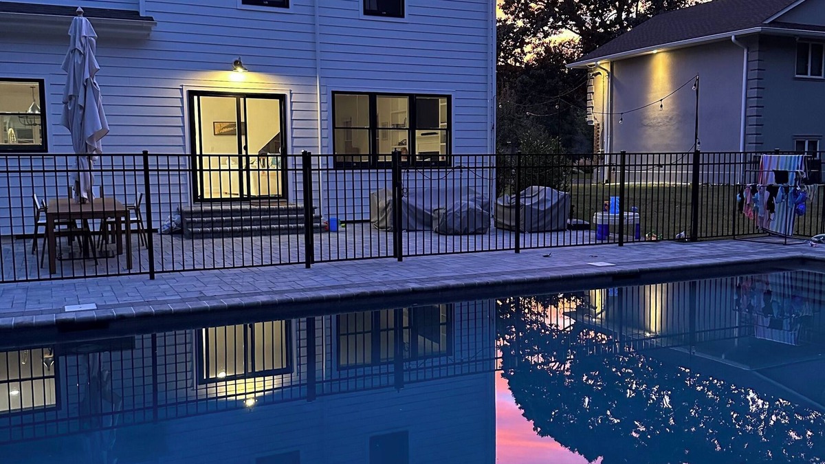 East Marion House | 4-bed 3.5-bath house with fenced heated pool and hot tub, fire pit, kids swings