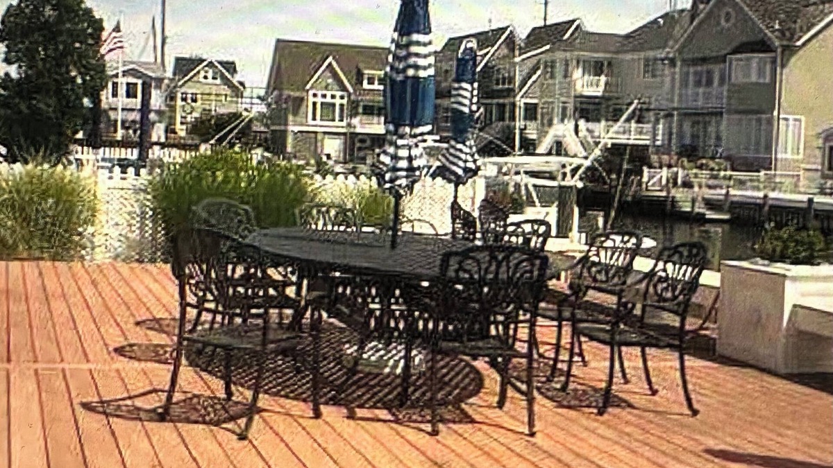 Normandy Beach House | 4 bedroom beach home- lagoon front deck, fantastic sunset views, pet friendly,