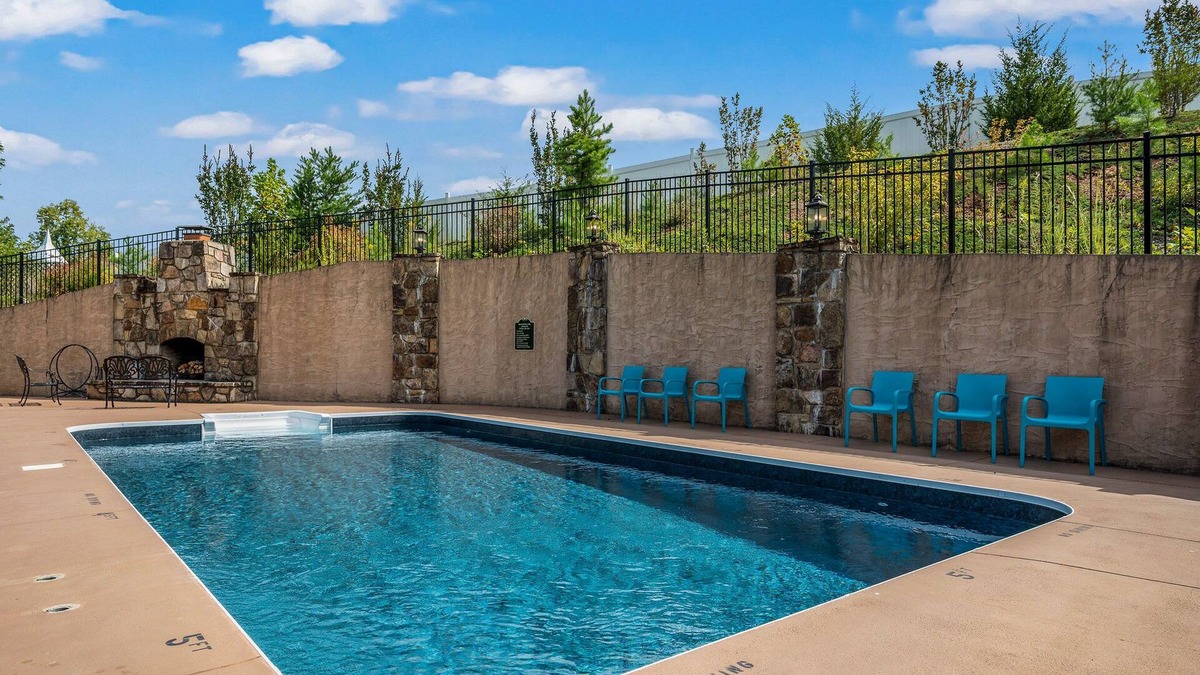 Sevierville Cabin | 4 King beds! Private, Heated Pool! Theater Room! Game Room! Bunks!