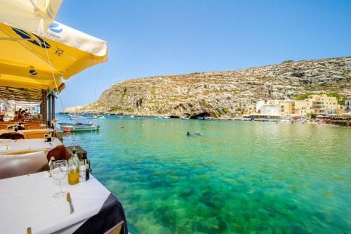 Xlendi Apartment | 40sec walk to Xlendi Beach - Fully Air Con & Heated Brand New Central Apartment