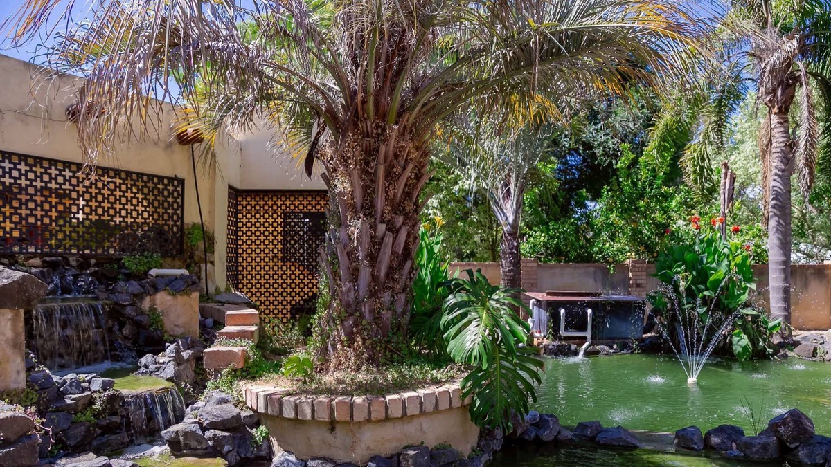 Greenfields House | 5 Bedroom home with an amazing back yard including a pool and large Koi ponds