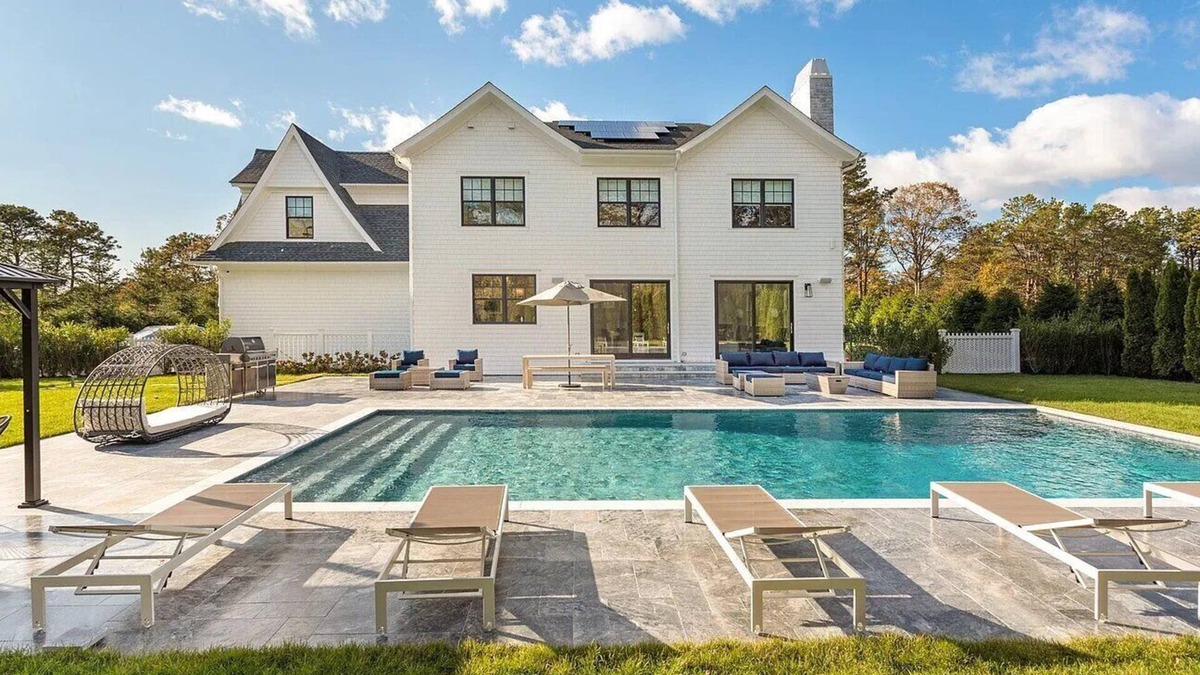 Shinnecock Hills House | 6,400 square foot traditional-style home with a private pool and sweeping...