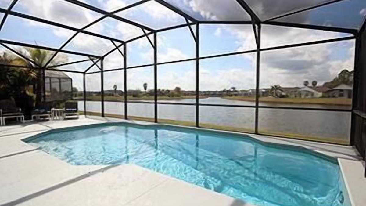 Eagle Pointe South House | 606 Peaceful Lake View family vacation home, single story. Close to Disney