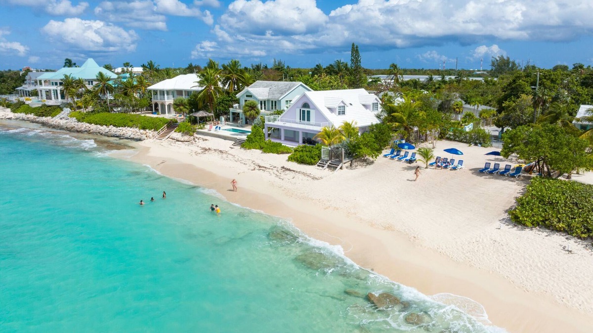 West Bay Condo | 7 Mile Beach views from the Roof terrace. Luxury Condo with Private Beach Club