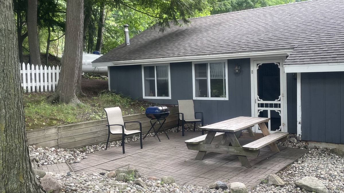 Ludington Cottage | #8 cottage comes with boat docks and shares over 600’ of frontage on Hamlin lake