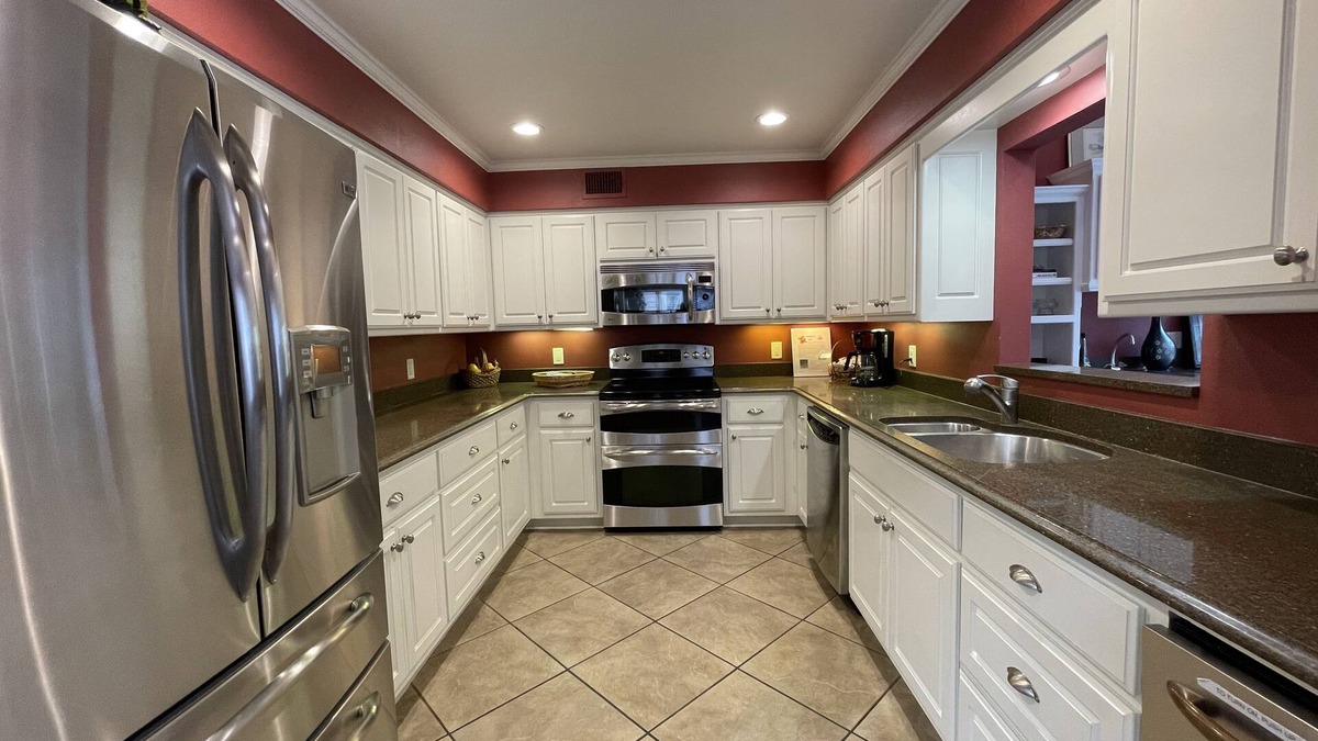 Mount Ida Condo | 80BPD, Four bedroom, two 1/2 bath log-sided condo with lake view , garage by RedAwning