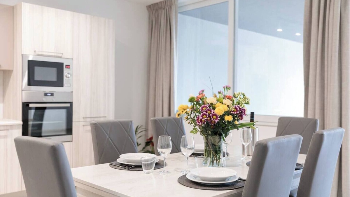 Għadira Apartment | 🌴 9ten11 Maisonette – Ground-floor seafront stay with large patio, modern interiors & direct access to Mellieha Beach 🐚☀️ Perfect for families, couples & business trips.