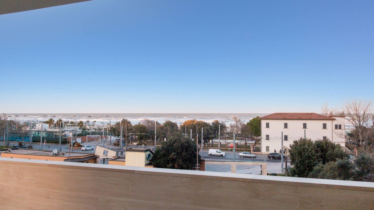 Riccione Apartment | A modern space just steps away from the sea, perfect for an exclusive vacation.