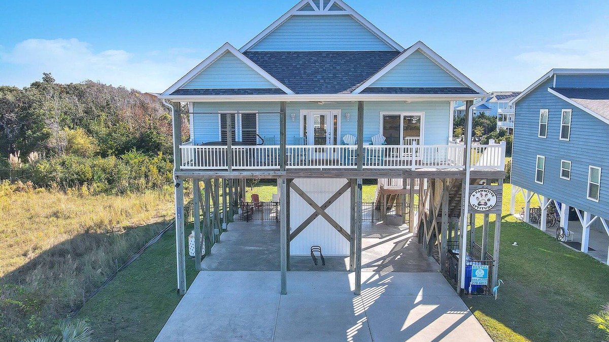 Yaupon Beach House | A Pawsitive Attitude: Ocean Views, Hot Tub, Dog-friendly with Fenced Yard