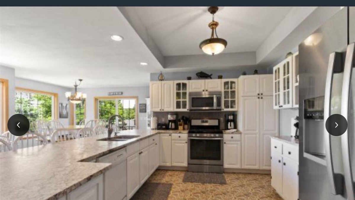 Delavan House | A Step Above the Rest! 104' of Frontage/Pier/New Pontoon Boat right on pier!