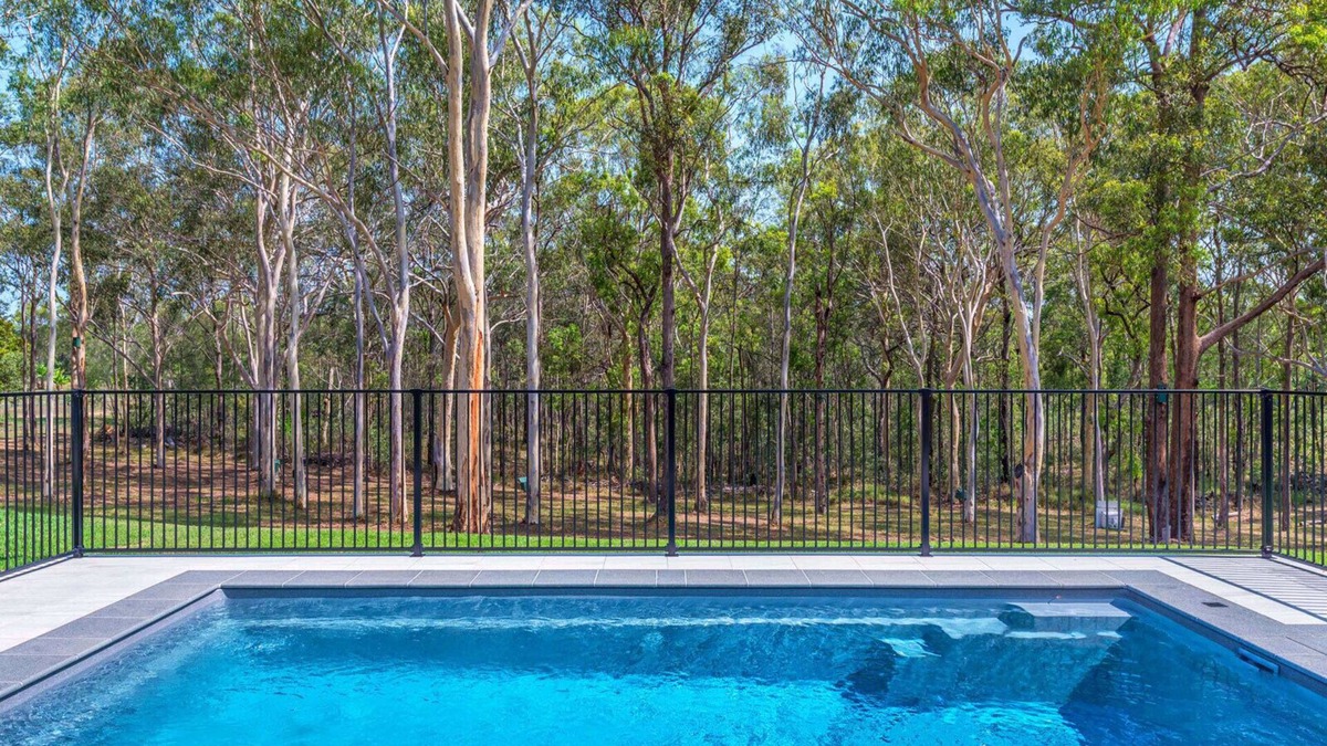 Dakabin House | A tranquil bushland retreat with KB, Ducted AC and access to a heated pool.