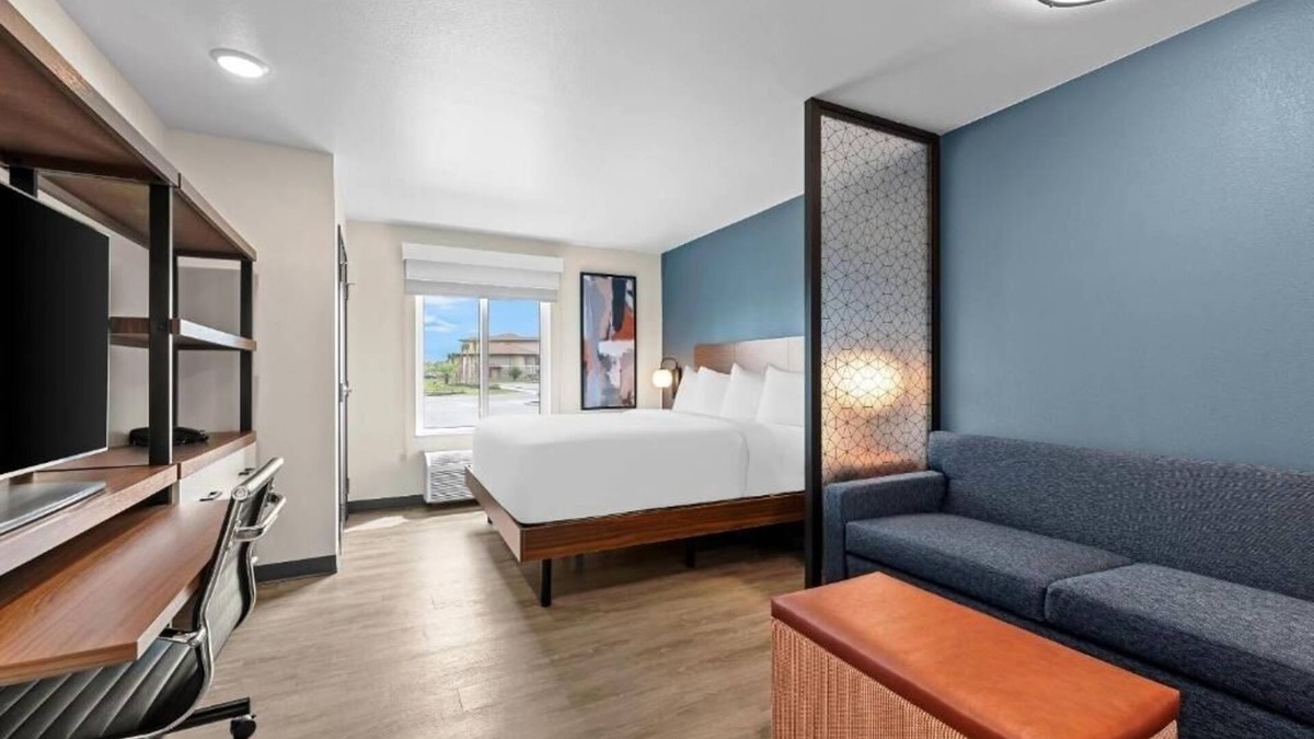 Brownsville Hotel | Accommodates 3 Suites | King Bed + Kitchen & Sofa
