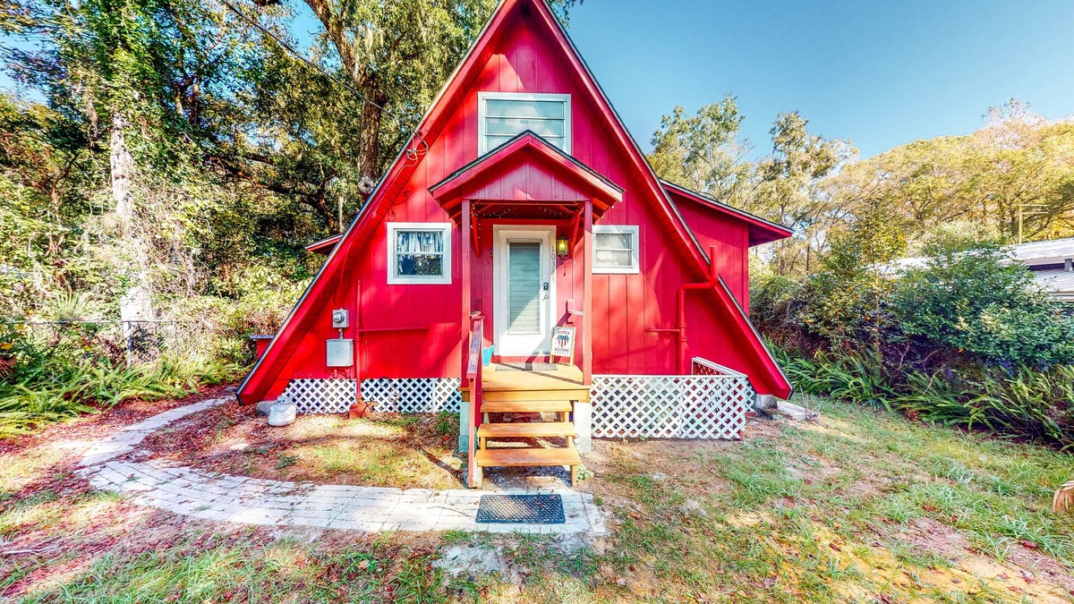 Bushnell Cabin | Adorable A-Frame with Riverfront Yard, Fishing Pier, & Firepit