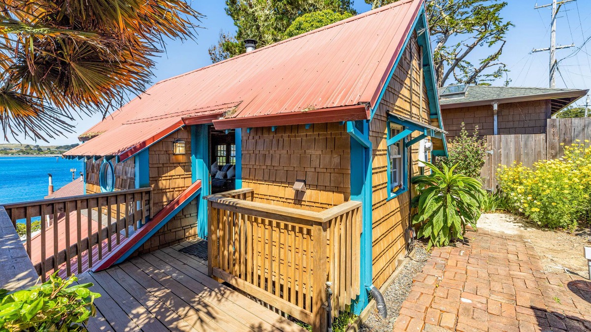 Old Town Cottage | Adorable waterfront cottage with private hot tub, deck, & wood stove