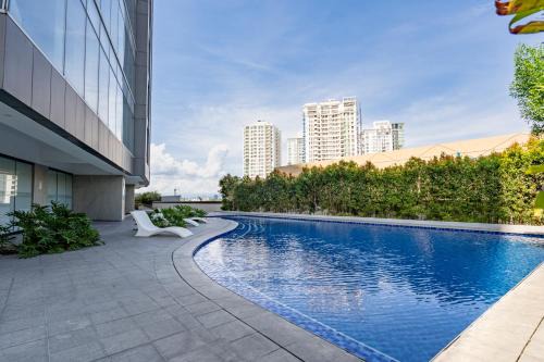 Poblacion District Apartment | Aeon Towers Private Residential Apartments I Next to Abreeza Ayala Malls I Prime Location l Fast Wifi l Free Pool I Managed by Bleuspace