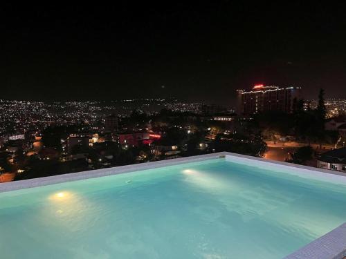 Kigali Apartment | Affordable Premium Studio Home with Free Infinite Pool, Gym, Office next to Convention Center