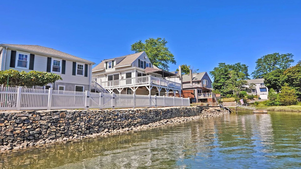 Beverly House | Afternoon Delight: Toast the beauty of the river from the waterfront deck